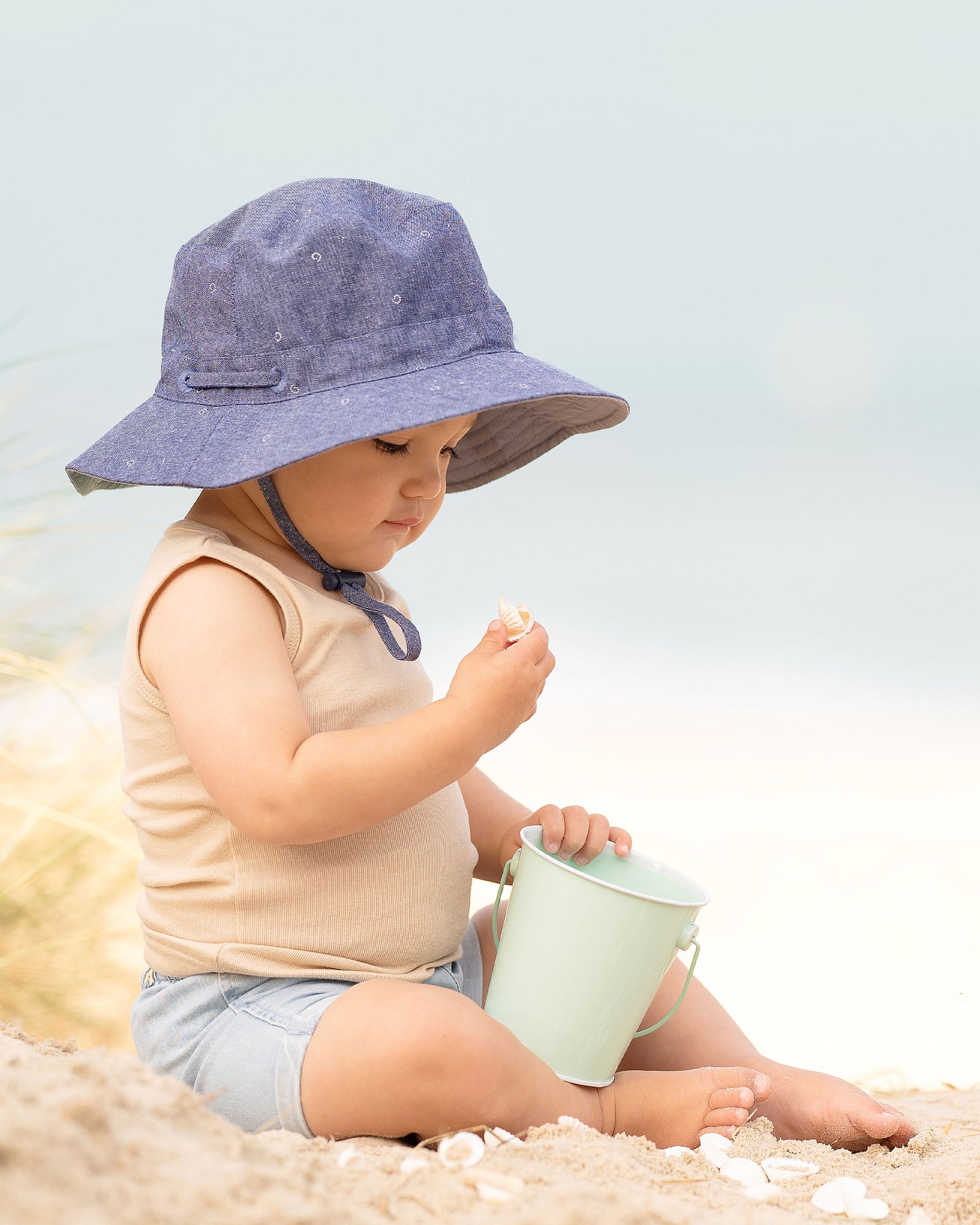 Toshi Sunhat Xavier /ink [sz:s]