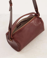 Load image into Gallery viewer, Juju &amp; Co Small Bolster Bag Maple
