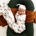 Load image into Gallery viewer, Snuggle Hunny Dino Organic Jersey Wrap &amp; Beanie Set
